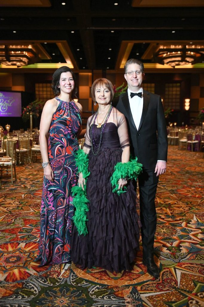 Kate Hays, Michele Malloy, Pete Hays  at the University of St. Thomas Mardi Gras ball.