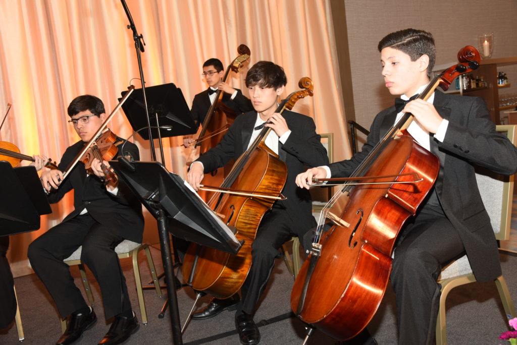 Virtuosi of Houston students perform at the opening of the InterContinental Houston Medical Center Hotel. (Photo by Alexander's Fine Portrait Design)