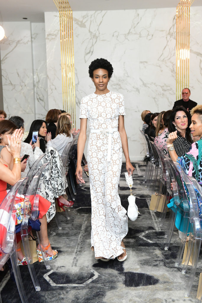 Michael Kors white lace jumpsuit in the Saks Fifth Avenue presentation. (Photo by Daniel Ortiz)