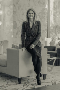 Lynn McBee photographed at her new high-rise apartment. (Photo by Misael Rodriquez)