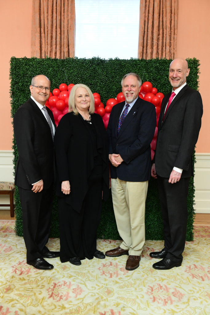 Ken Wells, Marilyn Gambrell, Dr. Chris Greeley, Rob Wisner at the Cherish Our Children International luncheon. (Photo by Daniel Ortiz)