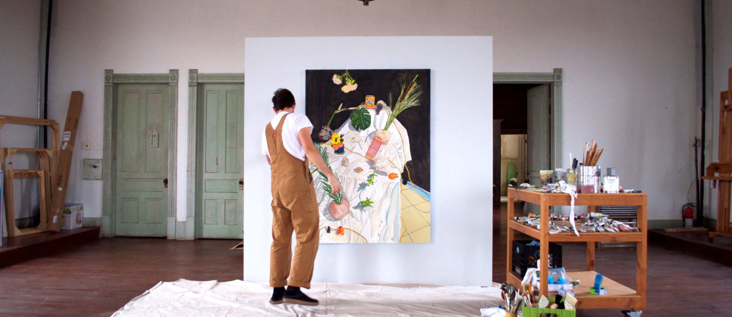 Bradley Kerl painting in the third-floor studio at 100W, Corsicana, Texas (Photo by Kyle Hobratschk)