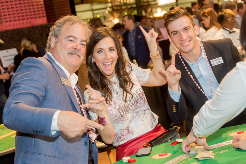 Cal & Hannah McNair, Charlie Hartland at the Houston Cattle Baron's Ball at the George Ranch.  (Photo by Mike Charlton)