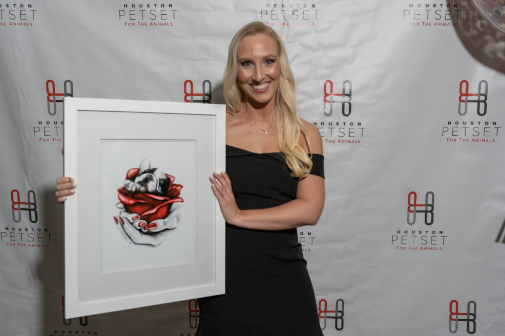Codi Land with 'Puppy Love' by Androos Art at the Club PetSet Young Professionals party. (Photo by Kathlyn Dragna Photography)