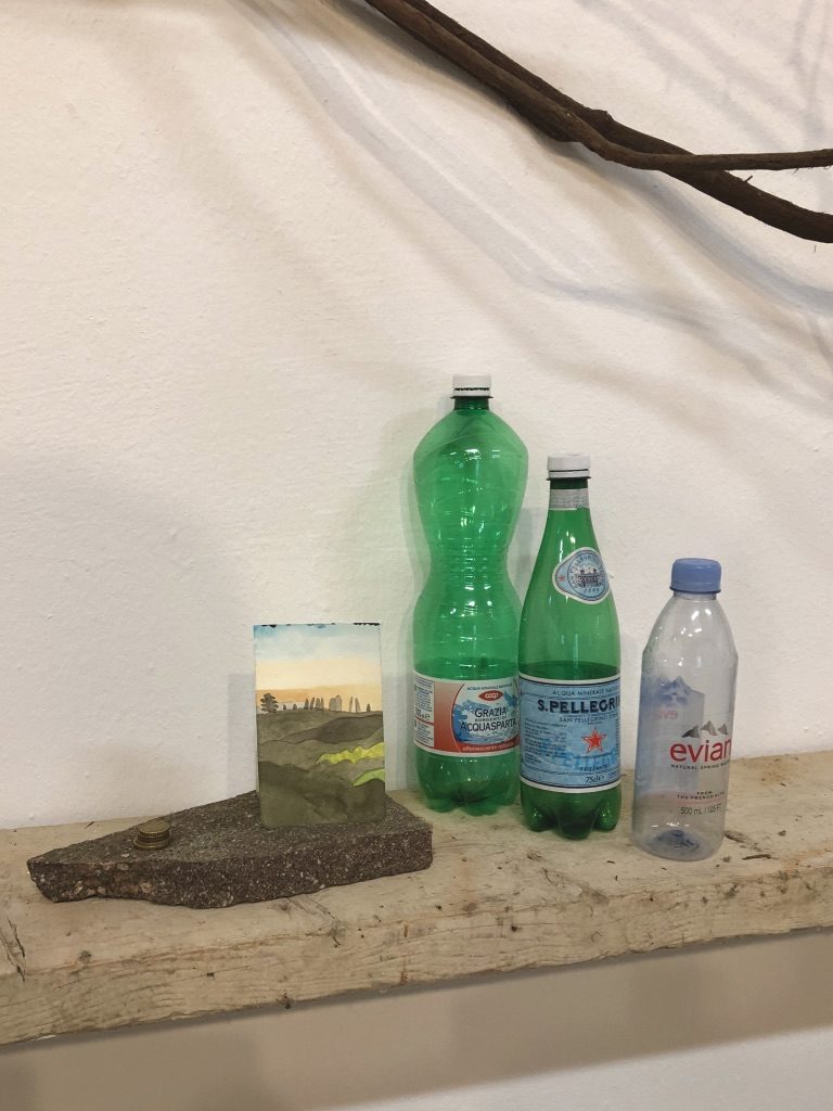 Out of the box: detail of the author's installation including found objects and works on paper. (Photo by Bradley Kerl)
