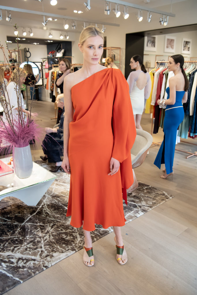 Model in an orange Esteban Cortazar creation. (Photo by Bruno, Snap The Picture)