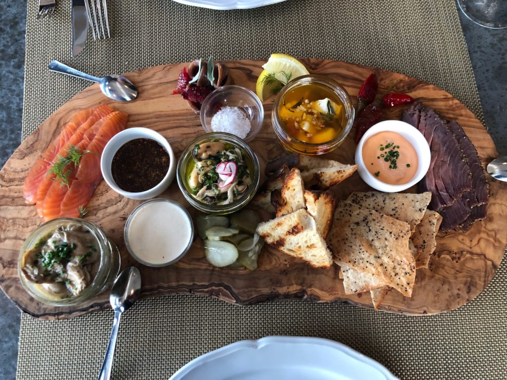 The 1751 Sea and Bar Charcuterie Board features a rare selection of smoked seafood. (Photo by Shelby Hodge)