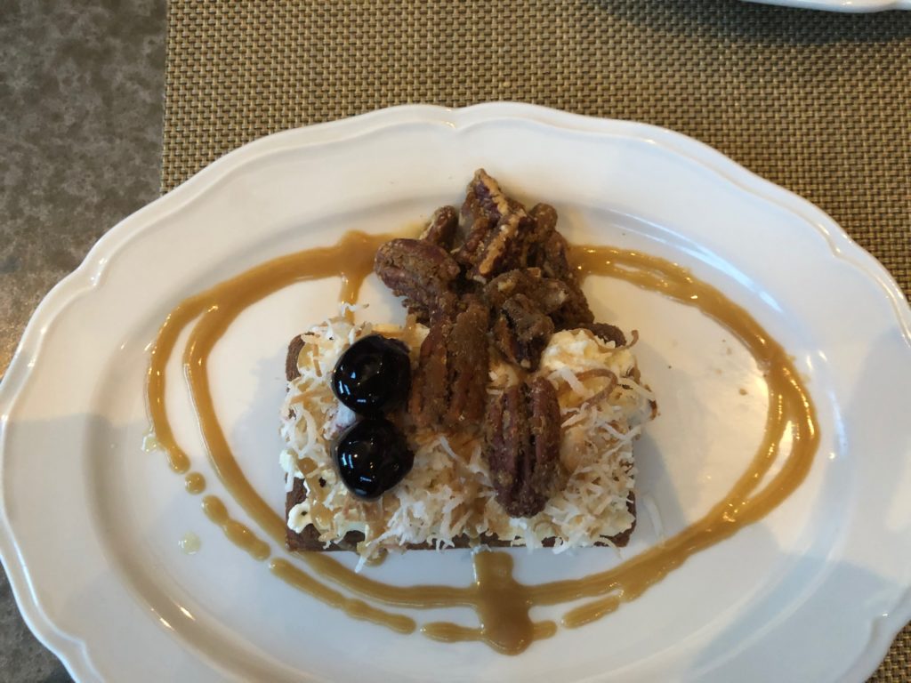 The coconut cake just one of many tempting delights on the 1751 Sea and Bar dessert menu. (Photo by Shelby Hodge)