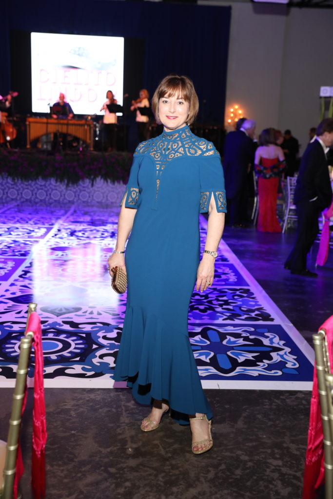 Leigh Smith wore a Lucian Matis teal gown to the 2019 Houston Grand Opera Ball. (Photo by Priscilla Dickson)