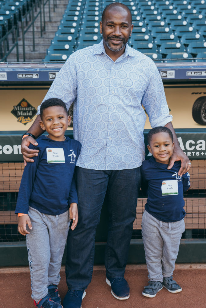 Noah and Ezra Woods with Dad at Minute Maid Park during the Texas Children's Hospital Family Fun Day. (Photo by Chin Phan)