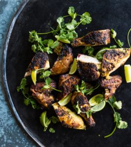 cook like a local chris shepherd cookbook grilled herb-marinated chicken (Photo by Julie Soefer)