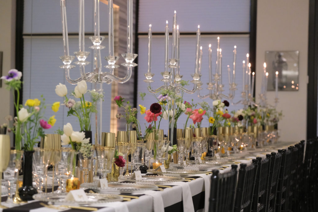 One grand table is set in Tootsies for the Andrew Gn dinner prepared by Monarch Catering. (Photo by Daniel Ortiz)