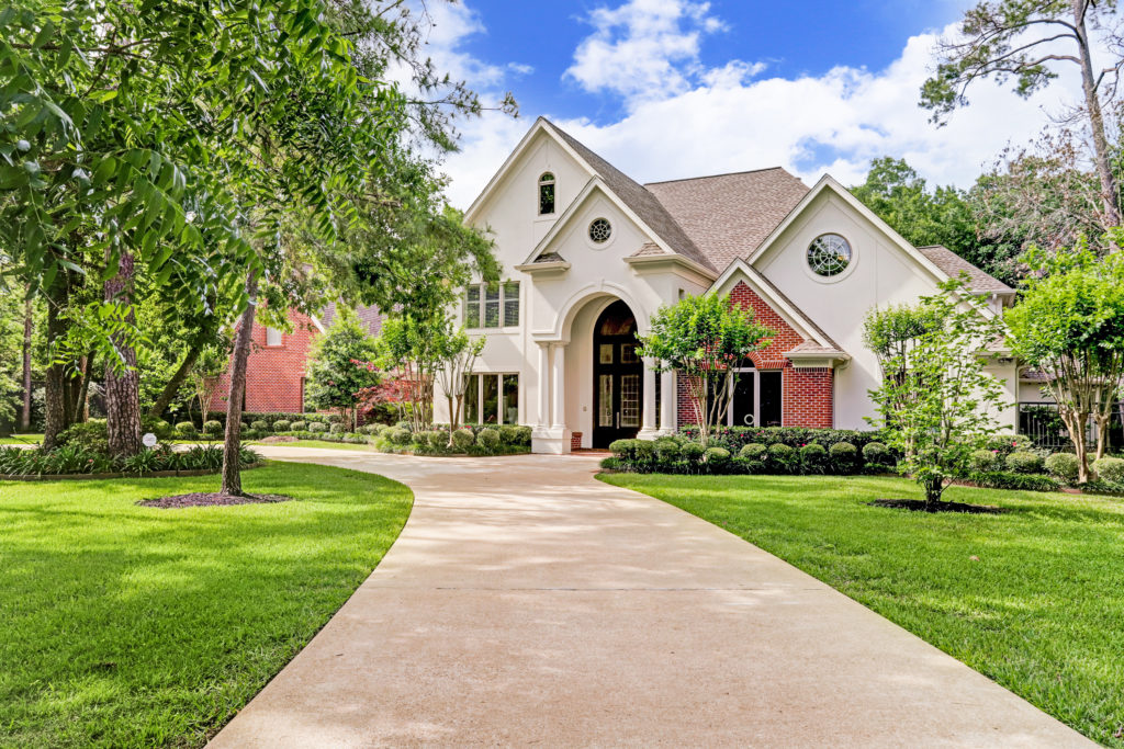 Curb appeal is strong on this Memorial area home at 12014 Tall Oaks, listed with John Daugherty Realtors. (Photo by TK Images)