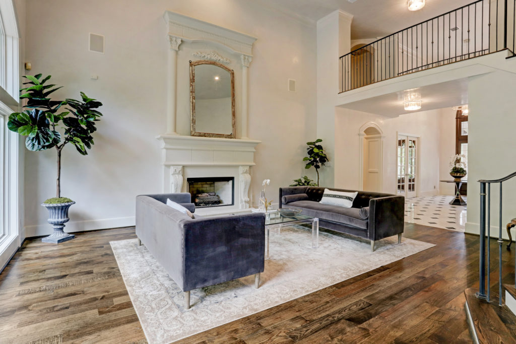 The living room of the 7,800 square foot home at 12014 Tall Oaks on view at the John Daugherty Realtors Spring 
Soirée. (Photo by TK Images)