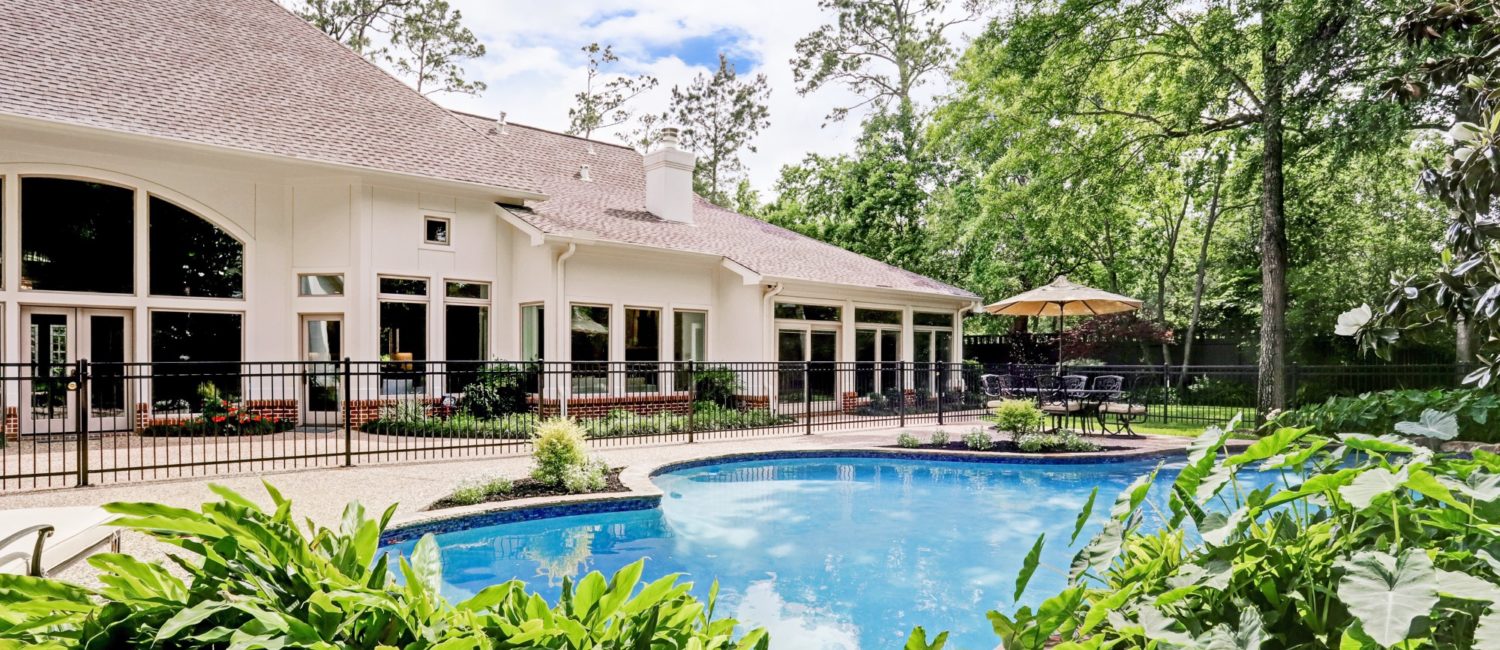 The house at 12014 Tall Oaks sits on more than an acre of tree-shaded land in the heart of Memorial.