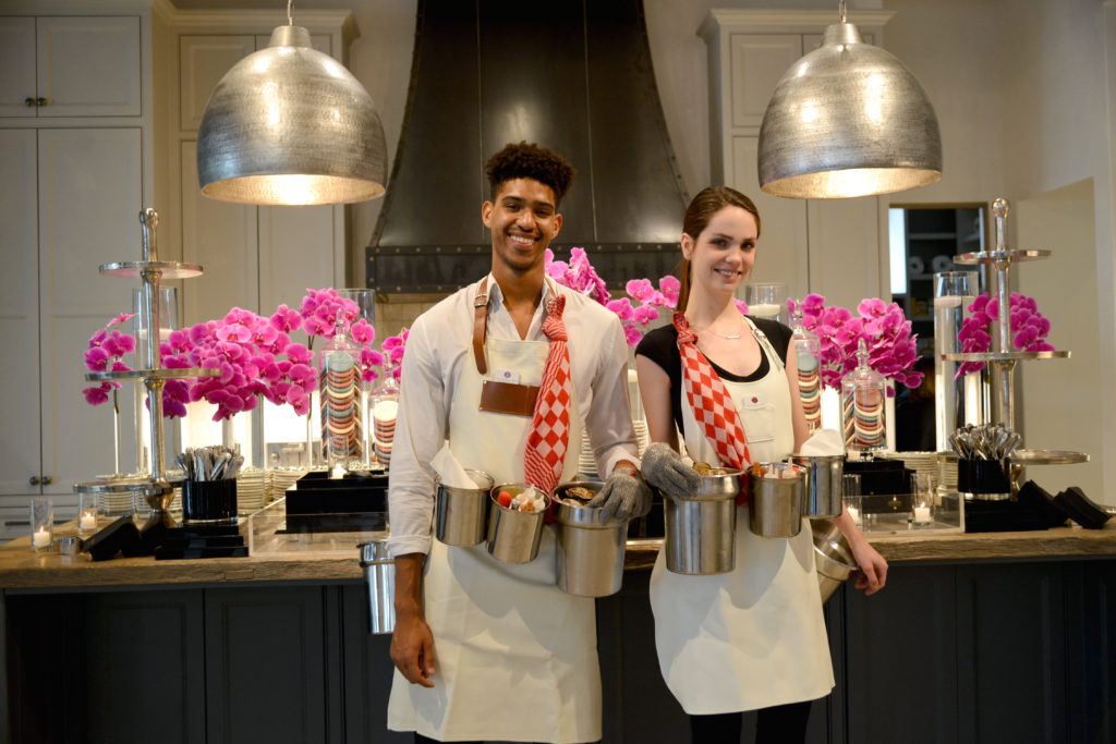 Strolling oyster shuckers from A Fare Extraordinaire just one element of the tasty offerings at the Theorem Wine release party (Photo by Al Torres Photography)