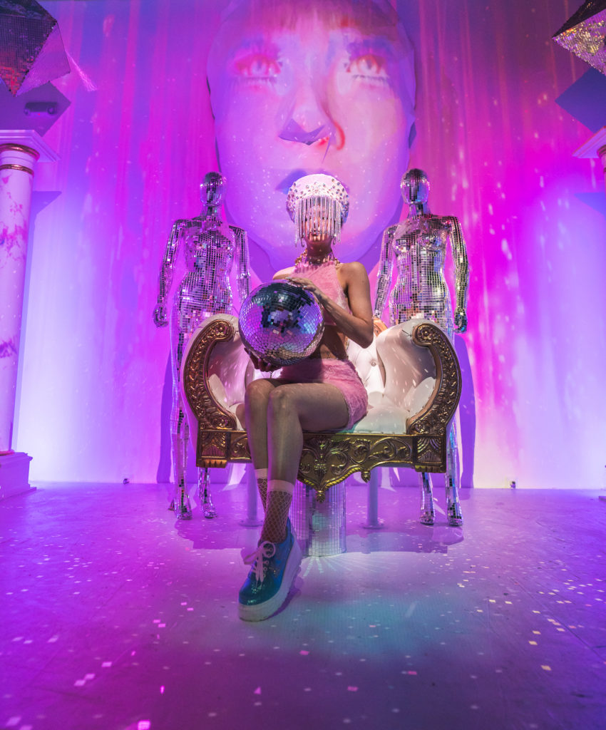 Whoever sits on the throne will have their face projected on the giant head above.  (Photo by Timothy Alsbrooks)