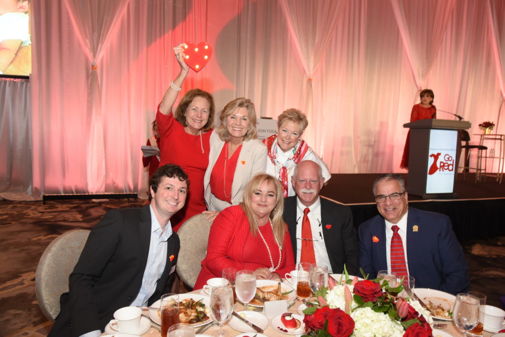 Debbie Moore, Cindy Taylor, June Hailey, Christopher Walker, Beverly Persse, Dr. David Persse, Frank Ciacco at the American Heart Association Go Red for Women luncheon.Debbie Moore.