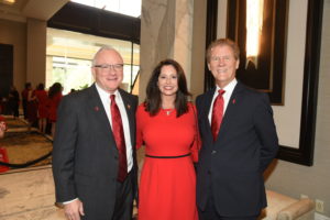 John Crum, Rickie Duke, Dr. Patrick Carter at the annual Go Red for Women luncheon.