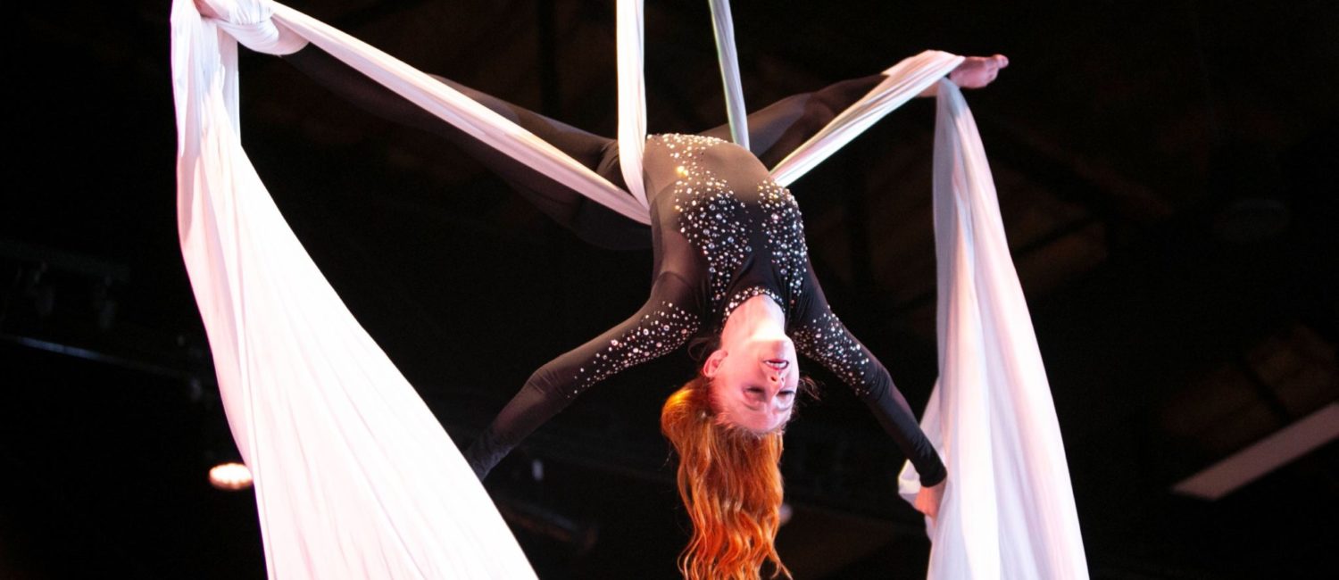 Aerialist Kenali Kendrick spins overhead while Mercury musicians perform French pieces. (Photo by Scott Villalobos, CatchLightGroup.com)