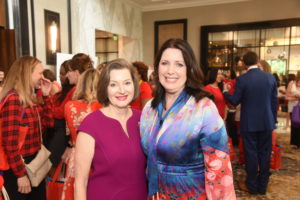 Marilynn Adame, Julie Roberts at the American Heart Association Go Red for Women luncheon.