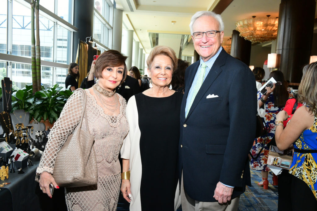 Patricia Herrera, Philamena Baird, Bill King at the Latin Women's Initiative luncheon and fashion show. (Photo by Daniel Ortiz)