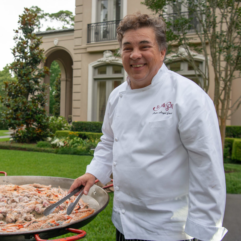 Chef Pedro Angel Garcia of El Meson cooking paella at the Recipe for Success Delicious Alchemy dinner. (Photo by Michelle Watson CatchLightgroup.com)