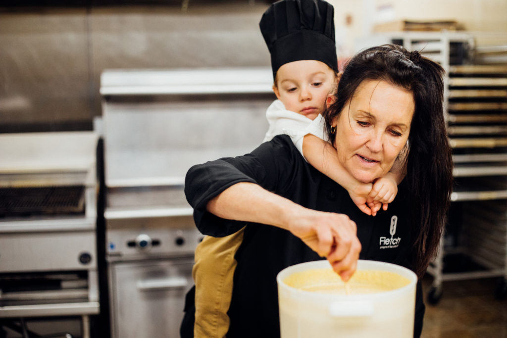 Vic Fletcher can cook with a grandson on her back. (Photo by  James Coreas)