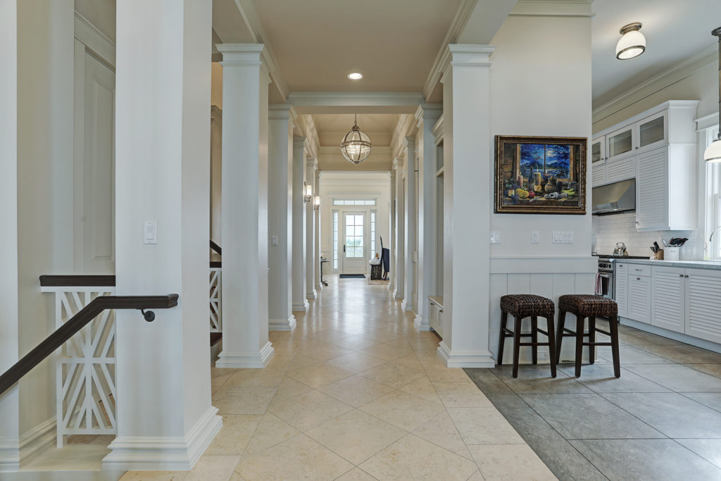 Love the columned corridors that run through the main floor of this Beachtown home on Galveston Island. (Photo by TK Images)