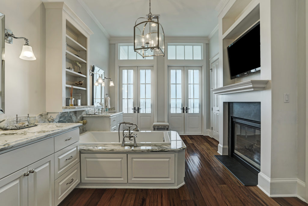 The master suite bath at this Beachtown residence rings regal. (Photo by TK Images)