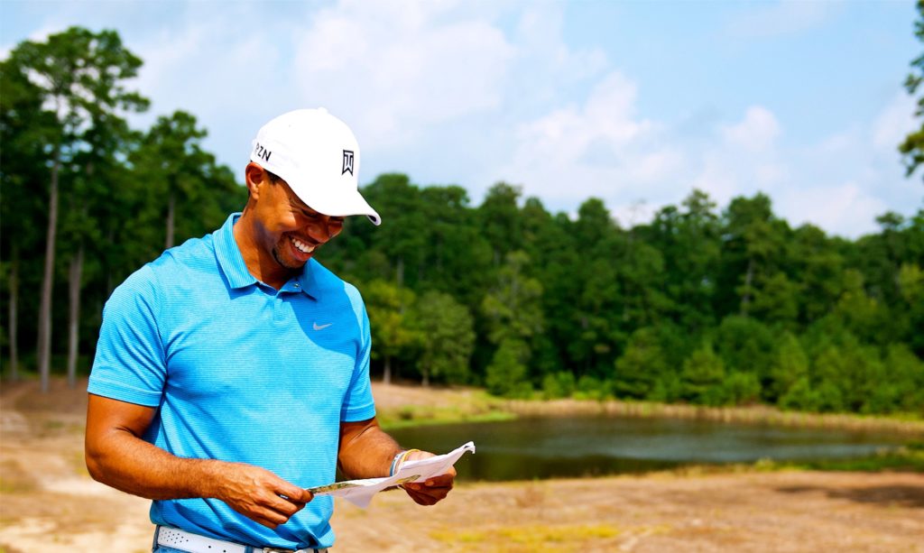 Tiger Woods is very hands on with the creation of his golf courses. Here he is shown working on Bluejack National, the private course wonder in Houston's shadow that is his first U.S. golf course design period. (Courtesy Bluejack National)