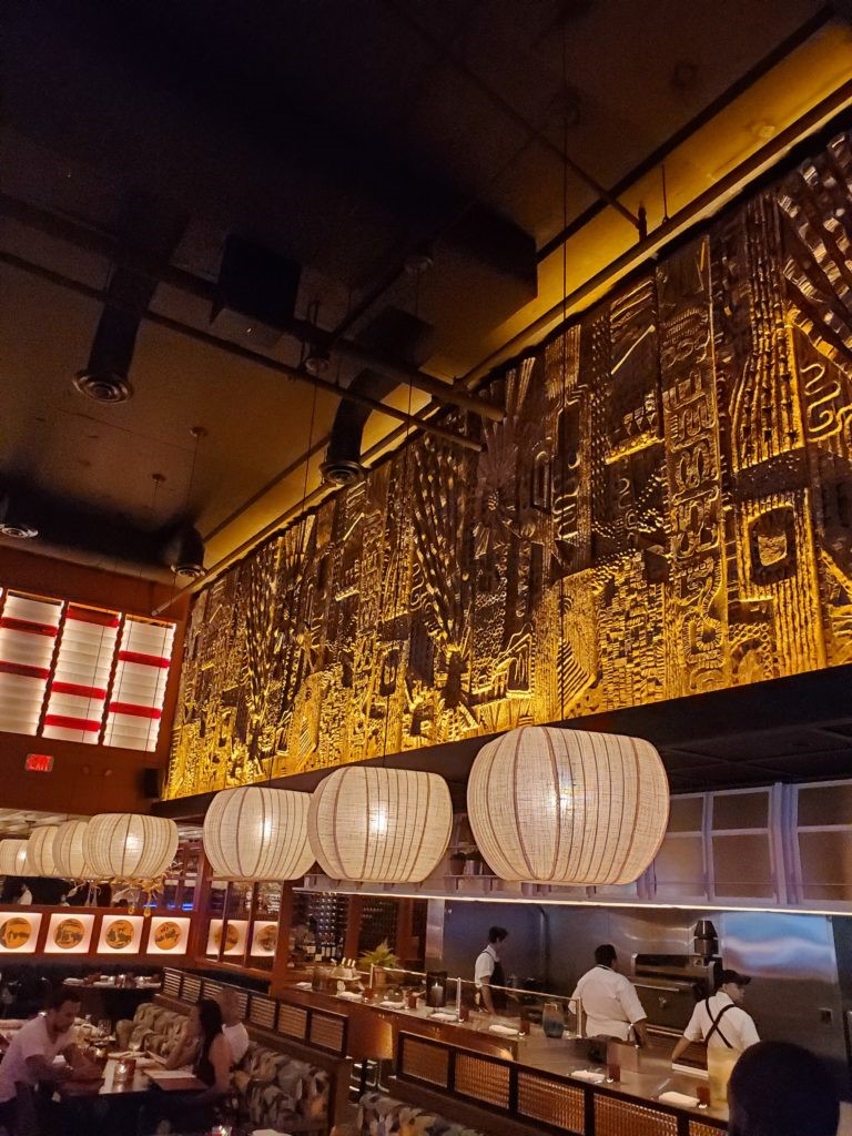The brutalist mural above the open kitchen in MAD is the Spanish designer's nod to Gaudi's Sagrada Familia. (Photo by Shafik I. Rifaat)