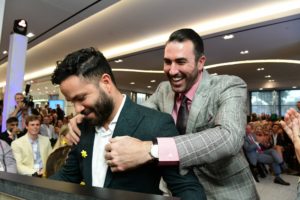 José Altuve gets a bear hug from Justin Verlander