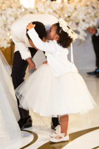 Flower girl Kensli, the couple’s daughter. (Photo by Duke Images)