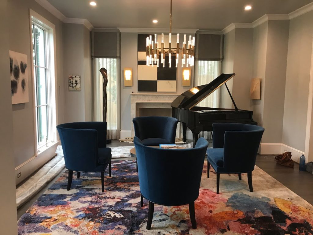 A sneak peek of the formal living room designed by Mary Wilson, complete with a Steinway Spirio baby grand piano