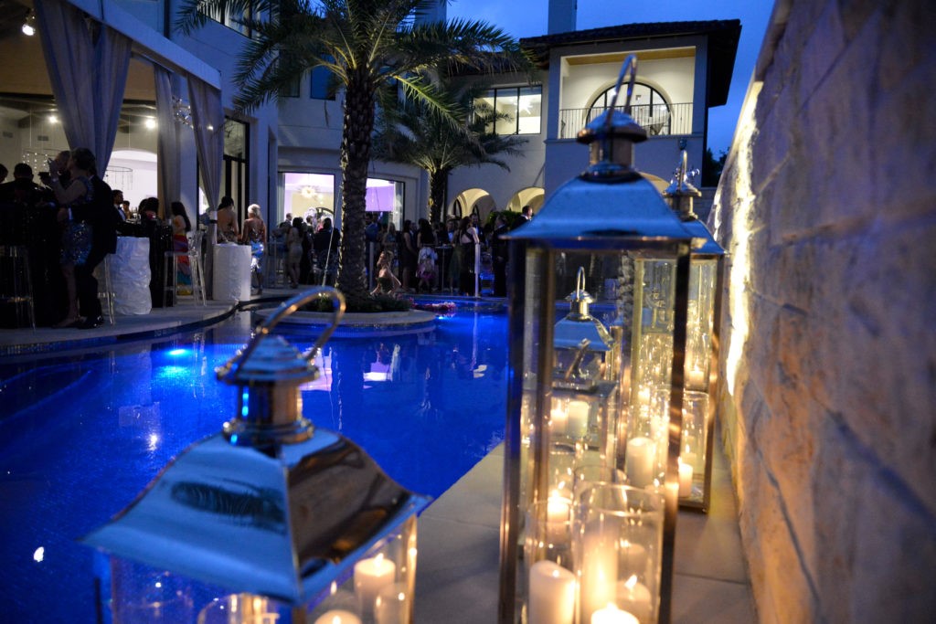 As the night grew on, the candlelight became even more dramatic at the Theorem Wine release party. (Photo by Al Torres Photography)