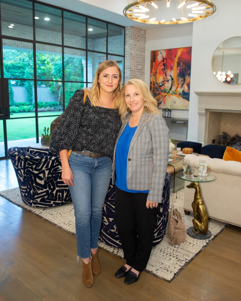 Jordan Geibel, Cathy Westmoreland at the Tupper Lake open house saluting Compass.