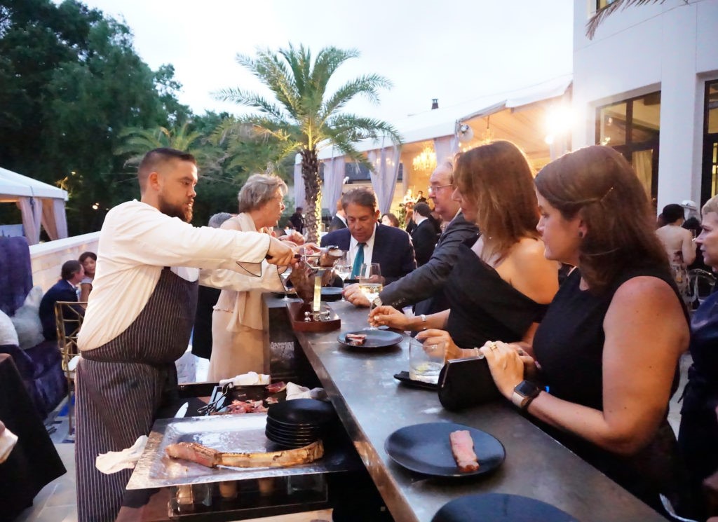 Hand-sliced tomahawk steaks and Ibérica ham part of the menu at the Theorem Wine Release Party. (Photo by Al Torres Photography)
