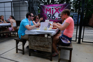 Guests enjoying crawfish at Holman Draft Hall; Photo by Daniel Ortiz