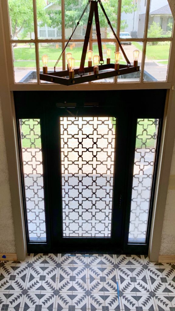 The foyer of Bella Villa includes brand new lighting. Photo by Marc Reviere 