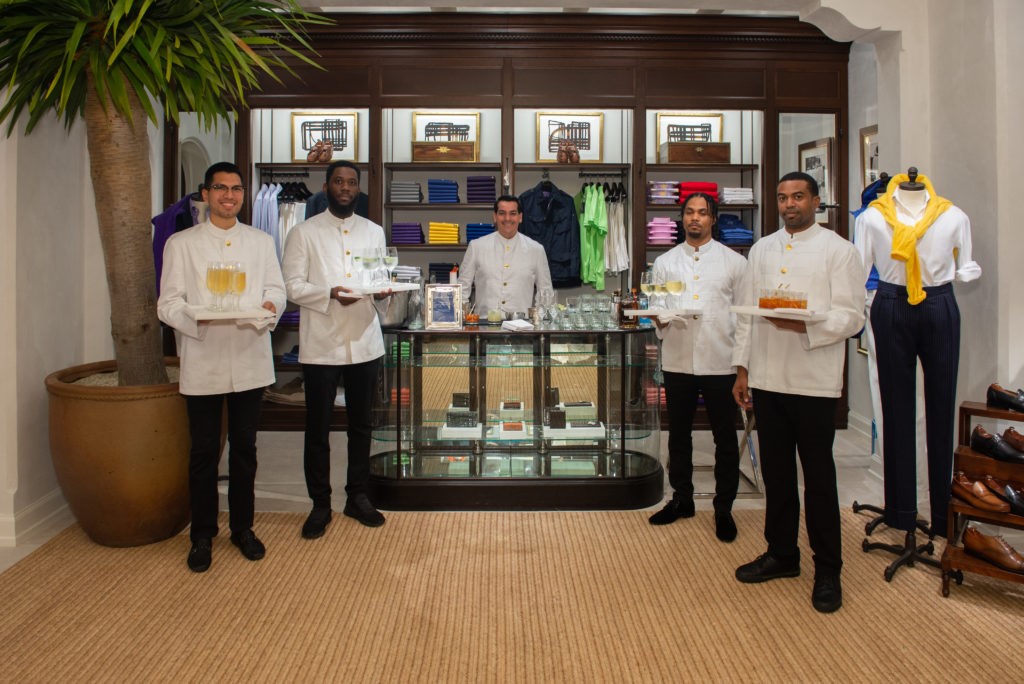 A Fare Extraordinaire wait staff ready for guests at the Ralph Lauren opening. (Photo by Emile C. Browne)