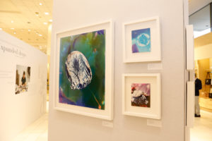Christelle Boulé’s photos are printed captures of perfume spritzed on paper and blown up to abstraction. Here, a colorful trio adorns a wall at Maison Francis Kurkdjian’s “Expanded Drops” at Neiman Marcus. (Photo by Priscilla Dickson) (Photo by Priscilla Dickson)