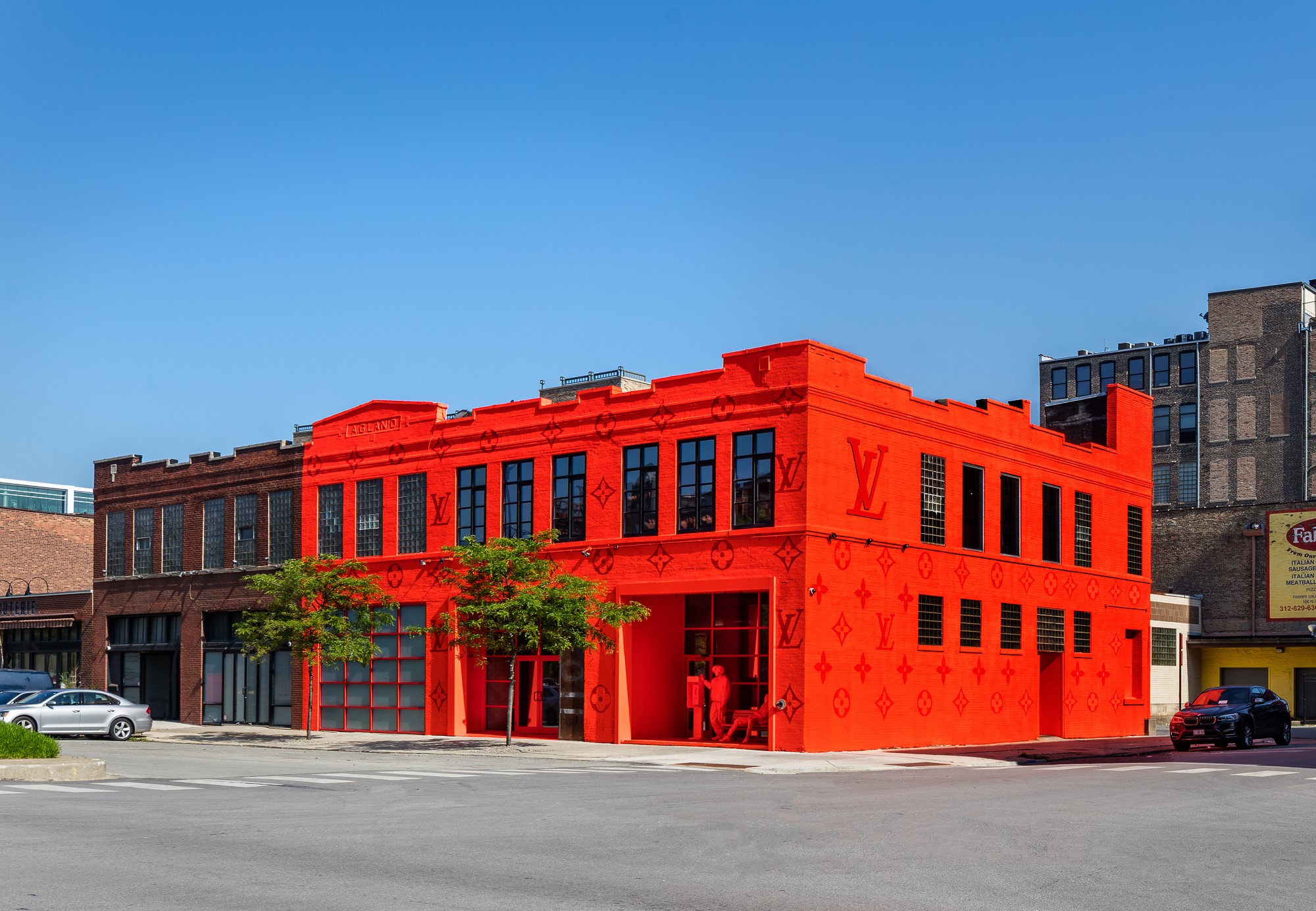 Louis Vuitton's Neon Orange Chicago Pop-Up Emerges as Summer's New Temple  of Cool