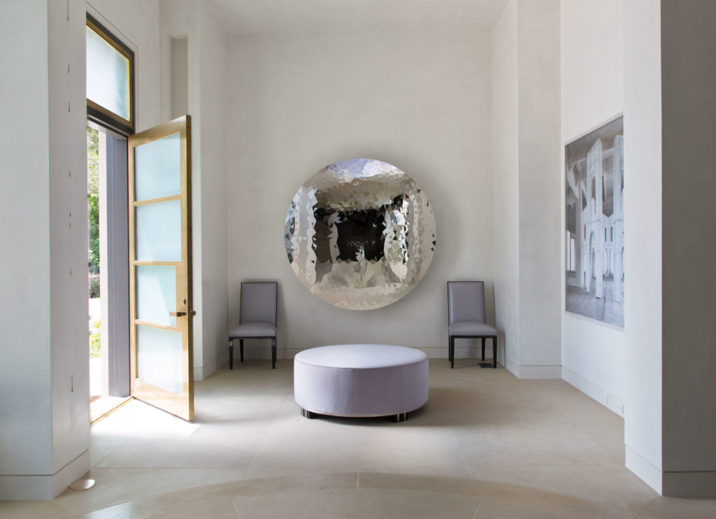Anish Kapoor's wall sculpture 'Untitled,' 2013. Lorin Marsh Ottoman in Coraggio lavender mohair. (Photo by Emily Minton Redfield)