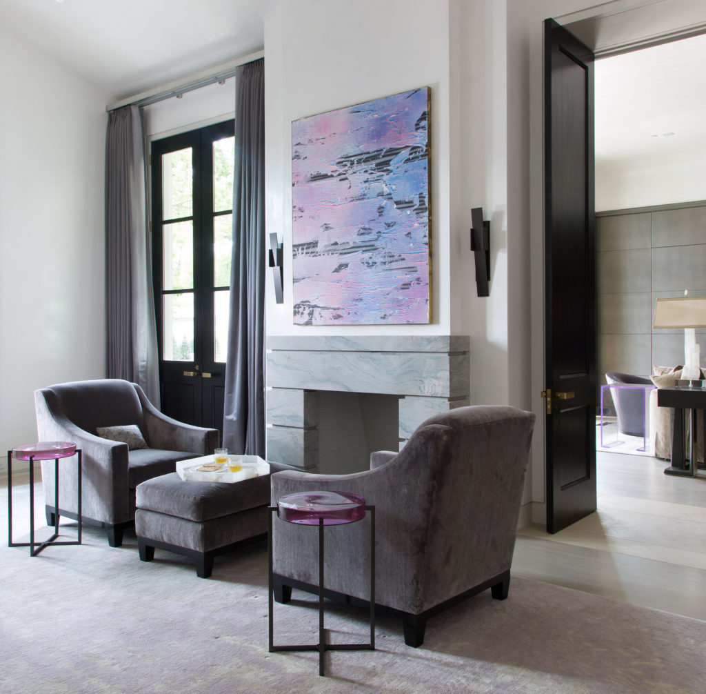 In the master bedroom, Joe Reihsen's 'Lunch with a Cougar,' 2014. A Rudin Chairs and ottoman from E.C. Dicken. Holly Hunt table. Sconces from Ferrell Mittman. (Photo by Emily Minton Redfield)