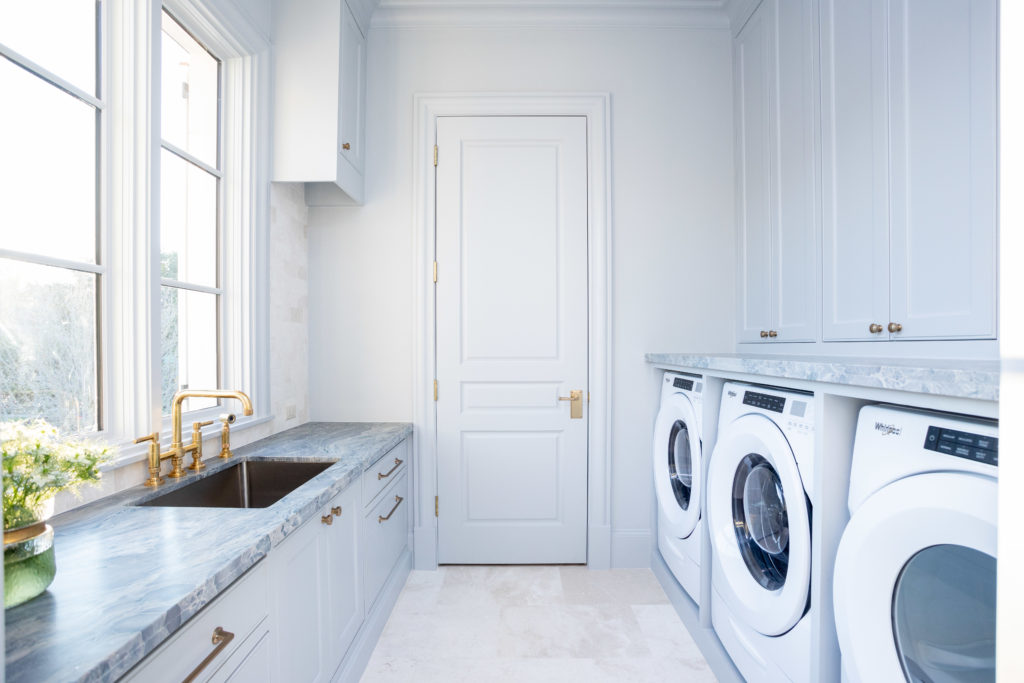 Even the laundry room has elegant touches in this River Oaks home. (Photo by Savannah Montgomery)