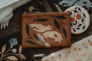 Hand-painted symbols elevate a leather pouch to a meaningful accessory (Photo by Christina Childress)