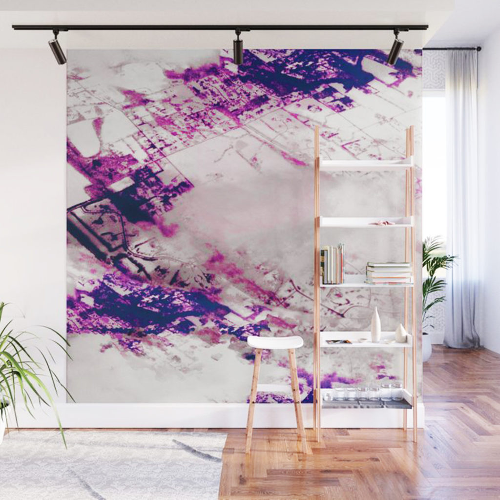 This print was imagined from an overhead map of Paris and was translated into fabric for a gown as well as this wall mural. (Courtesy photo)