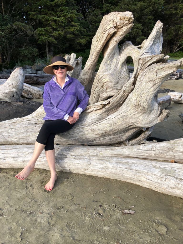 The author pauses in a stroll on the beach for a photo. (Photo by Shafik Rifaat)
