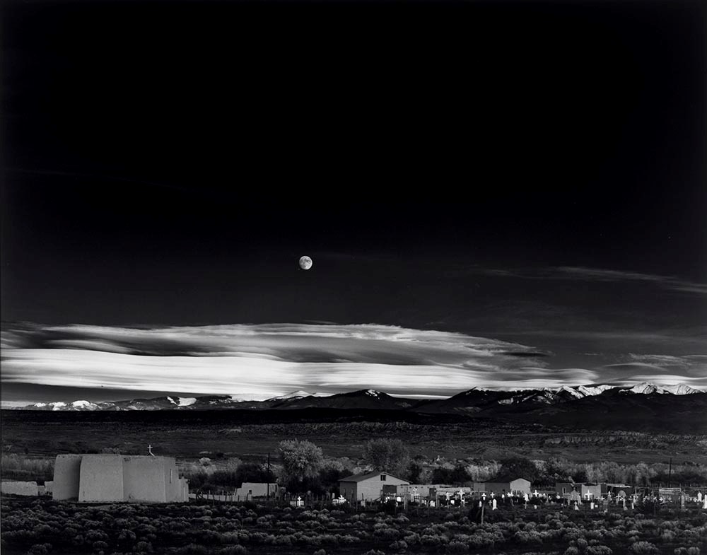 Ansel Adams' "Moonrise" (Hernandez, New Mexico, 1941) is one of many photographs in the MFAH's Shooting the Moon exhibit.